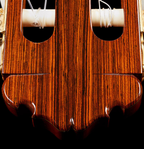 The headstock veneer and tuning machines of a 1973 Manuel Contreras classical guitar made of cedar and CSA rosewood