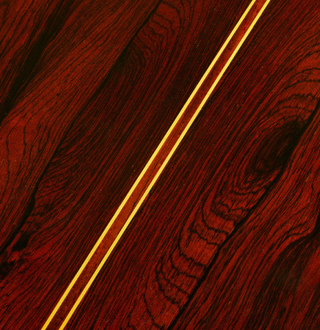 The back center seam of a 1985 Manuel Contreras "Double Top" classical guitar made of spruce and CSA rosewood