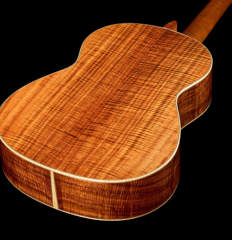 The back and sides of a 2016 Stephan Connor "640" classical guitar made of spruce and koa
