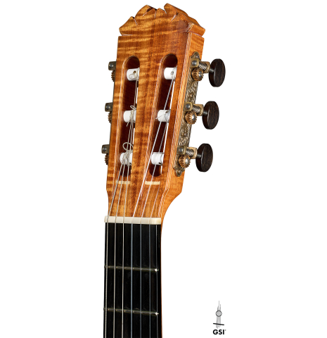 The headstock of a 2016 Stephan Connor "640" classical guitar made of spruce and koa