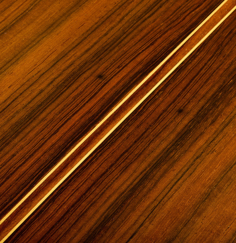 The back center seam of a 2010 Manuel Contreras II "1a Especial" classical guitar made of cedar and CSA rosewood