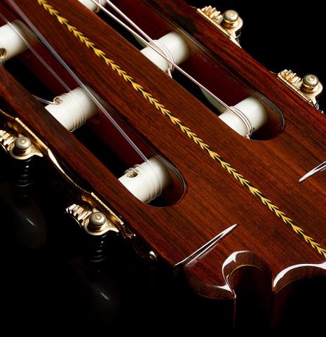 The headstock and tuning machines of a 2010 Manuel Contreras II "1a Especial" classical guitar made of cedar and CSA rosewood