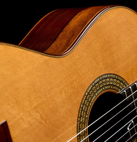 The soundboard, side and rosette of a 2010 Manuel Contreras II "1a Especial" classical guitar made of cedar and CSA rosewood