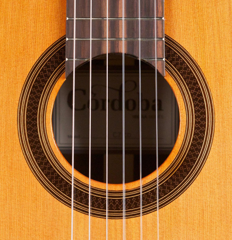 The rosette of a Cordoba "C7" classical guitar made with cedar top and Indian rosewood back and sides