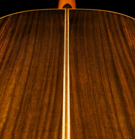 The back and sides of a Cordoba "C7" classical guitar made with cedar top and Indian rosewood