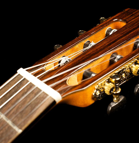 The headstock and machine heads of a Cordoba "C7" classical guitar made with cedar top and Indian rosewood back and sides