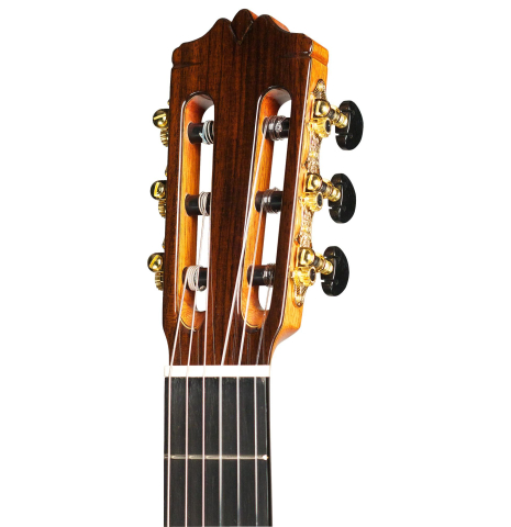 The headstock and machine heads of Cordoba C10 classical guitar