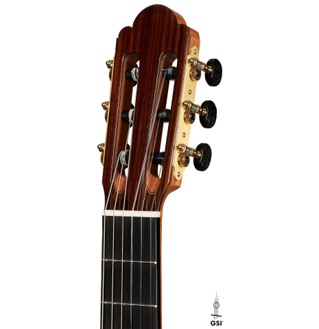The headstock of a Cordoba Guitars Master Series "Torres" classical guitar made of spruce and Indian rosewood