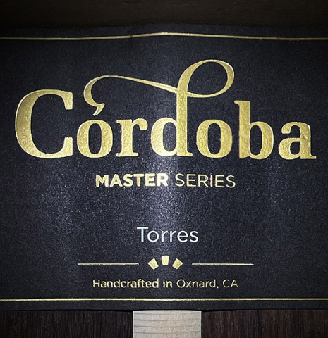 The label of a Cordoba Guitars Master Series "Torres" classical guitar made of spruce and Indian rosewood