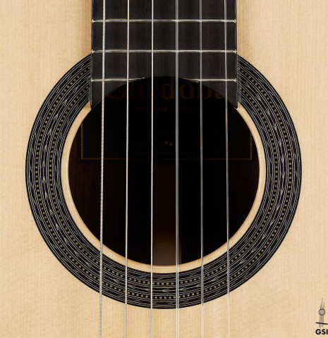 The rosette of a Cordoba Guitars Master Series "Torres" classical guitar made of spruce and Indian rosewood