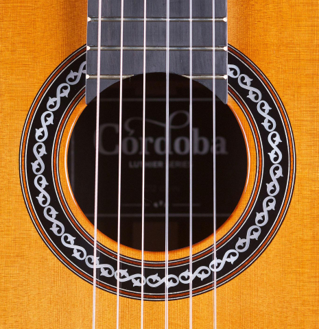 The rosette of Cordoba C12 classical guitar with cedar soundboard