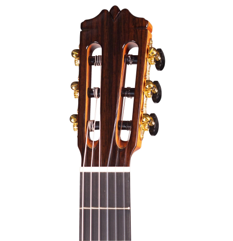 The headstock of Cordoba C12 classical guitar with cedar soundboard
