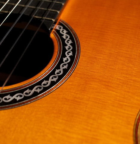 The close-up of a rosette of Cordoba C12 classical guitar