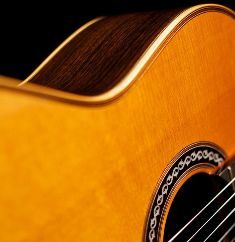 The soundboard and side of Cordoba C12 classical guitar