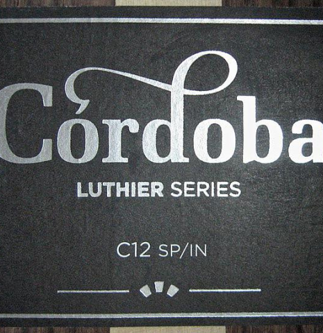 The label of Cordoba C12 classical guitar made with spruce and Indian rosewood