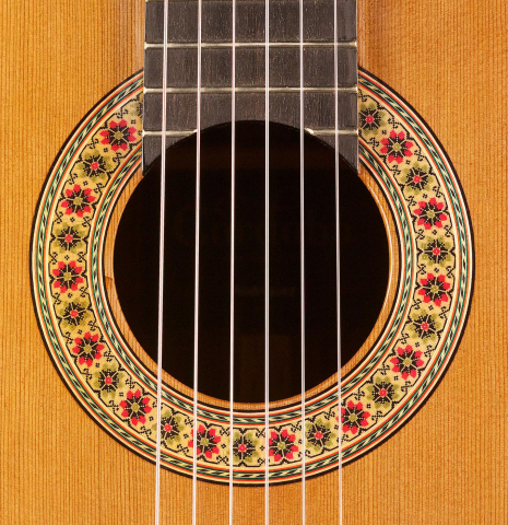 The rosette of a Cordoba Guitars Master Series "Rodriguez" classical guitar made with cedar and Indian rosewood.