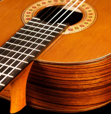 The soundboard of a Cordoba Guitars Master Series "Rodriguez" classical guitar made with cedar and Indian rosewood.