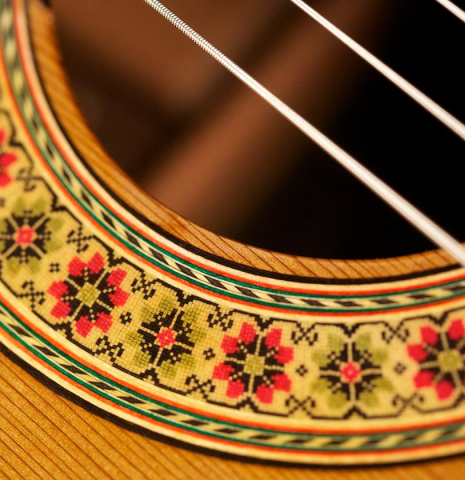 The rosette of a Cordoba Guitars Master Series "Rodriguez" classical guitar made with cedar and Indian rosewood.