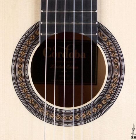 The rosette of Cordoba "45 Limited" SP/EB classical guitar made with spruce top and White Ebony back and sides