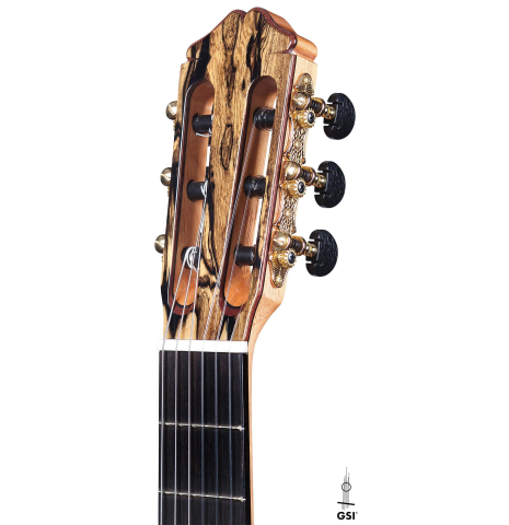 The headstock and machine heads of Cordoba "45 Limited" SP/EB classical guitar made with spruce top and White Ebony back and sides