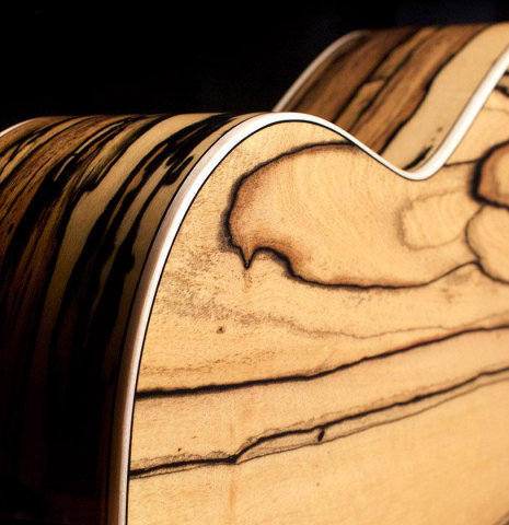 White Ebony back and sides of Cordoba "45 Limited" SP/EB classical guitar