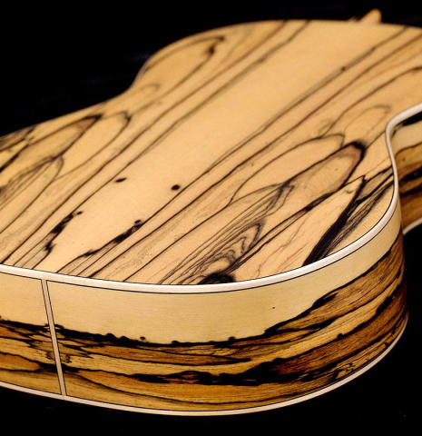 White Ebony back and sides of Cordoba "45 Limited" SP/EB classical guitar