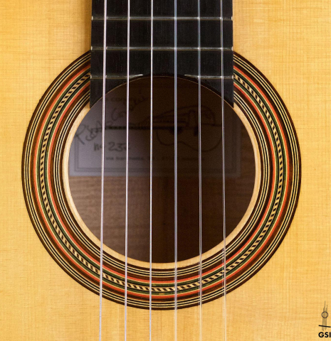 The rosette of a 2018 Paolo Coriani 1907 Enrique Garcia copy classical guitar made of spruce and maple
