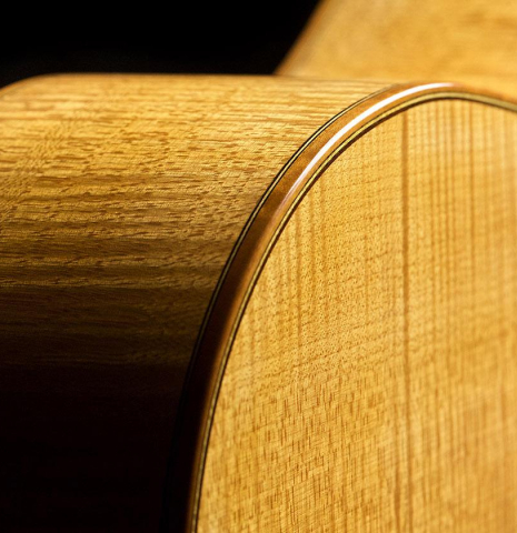 The binding of a 2018 Paolo Coriani 1907 Enrique Garcia copy classical guitar made of spruce and maple