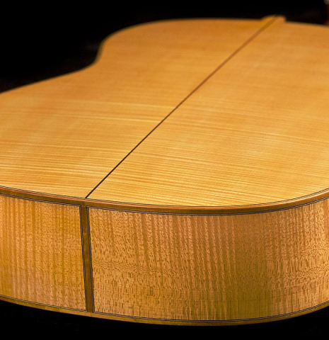 The back and sides of a 2018 Paolo Coriani 1907 Enrique Garcia copy classical guitar made of spruce and maple