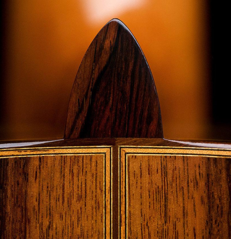 A close-up of the heel of a 2019 Luis Fernandez de Cordoba &quot;Homenaje a Torres&quot; classical guitar made with spruce and Indian laurel.