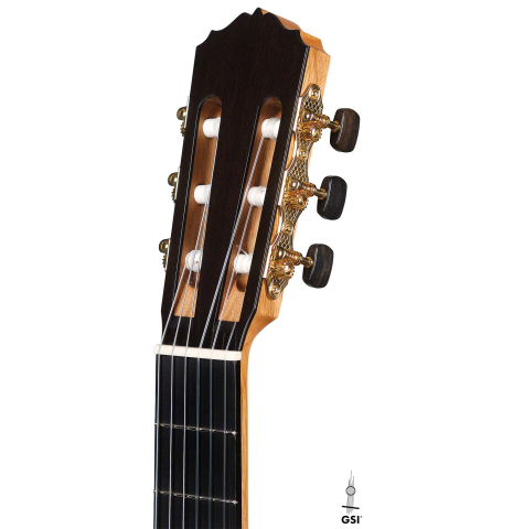 The headstock of a 2020 Luis Fernandez de Cordoba classical guitar made of spruce and black limba wood.