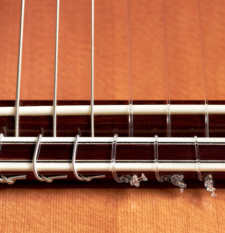 This is the bridge of a Cordoba "Double Top 25th Anniversary" classical guitar built in 2022.