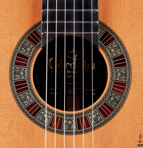 This is the rosette of a Cordoba "Double Top 25th Anniversary" classical guitar built in 2022. This guitar has a cedar soundboard and palo escrito back and sides.