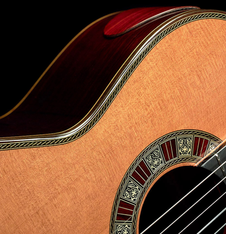 This is a Cordoba &quot;Double Top 25th Anniversary&quot; classical guitar built in 2022. This guitar has a cedar soundboard and palo escrito back and sides.