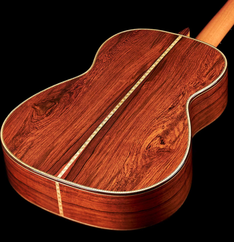The back of a 2022 Cordoba &quot;20th Anniversary&quot; classical guitar made of spruce and African rosewood