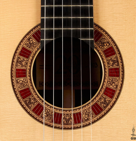The rosette of a 2022 Cordoba &quot;20th Anniversary&quot; classical guitar made of spruce and African rosewood