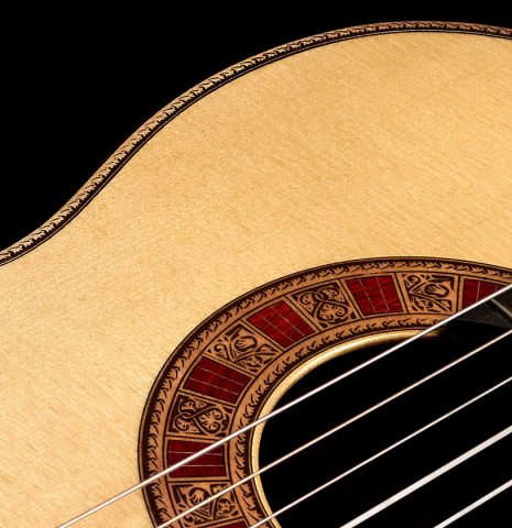 The rosette of a 2022 Cordoba &quot;20th Anniversary&quot; classical guitar made of spruce and African rosewood