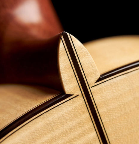 The heel and back of a new Cordoba Luthier Select Series &quot;Santos Hernandez&quot; made of spruce and maple