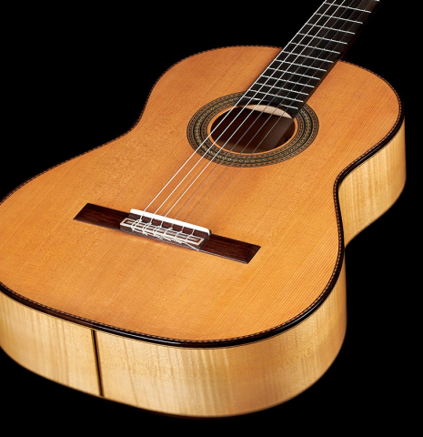 The top and sides of a new Cordoba Luthier Select Series &quot;Santos Hernandez&quot; made of spruce and maple