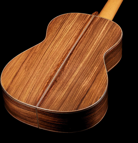 The back and sides of a Cordoba Guitars Master Series "Torres Lefty" classical guitar made of cedar and Indian rosewood