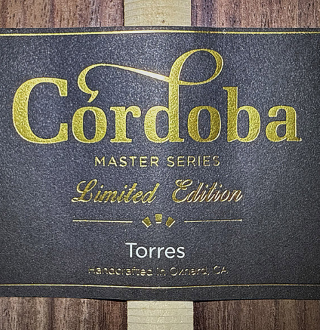 The label of a Cordoba Guitars Master Series "Torres Lefty" classical guitar made of cedar and Indian rosewood