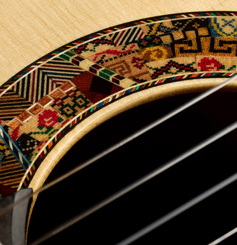 The soundhole of a 2026 Andy Culpepper "15th Anniversary" SP/CSAR classical guitar made of spruce and CSA rosewood