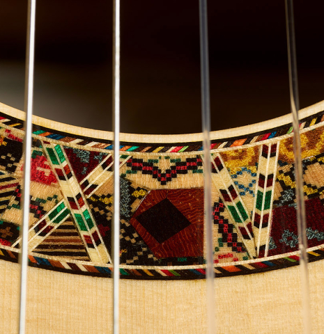 Detailed close-up of the rosette of a 2026 Andy Culpepper "15th Anniversary" SP/CSAR classical guitar made of spruce and CSA rosewood