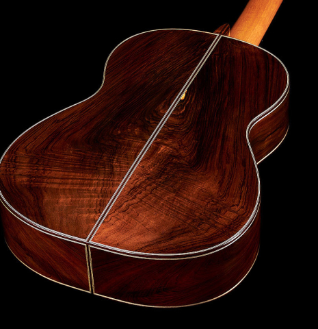 The back and sides at the foot of a 2024 Andy Culpepper classical guitar made of spruce and CSA rosewood