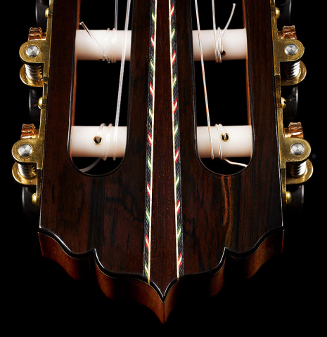 The headstock veneer and tuning machines of a 2024 Andy Culpepper classical guitar made of spruce and CSA rosewood