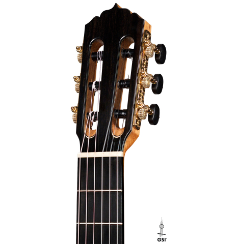 The headstock of a 2021 Andy Culpepper classical guitar made of spruce and cypress