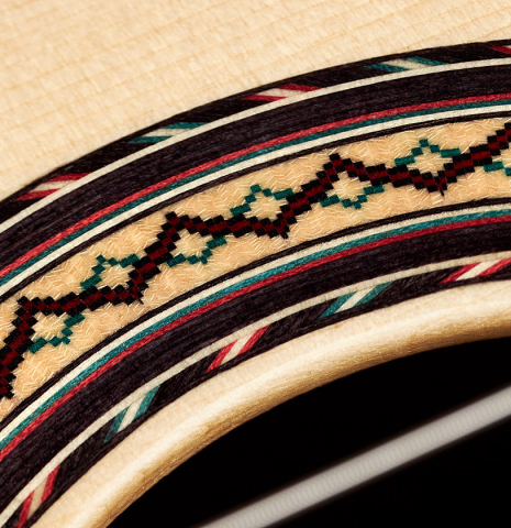 The rosette of a 2022 Andy Culpepper &quot;Lefty&quot; classical guitar made of spruce and Indian rosewood
