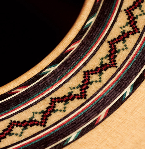 The rosette of a 2023 Andy Culpepper classical guitar made with cedar top and cocobolo back and sides.