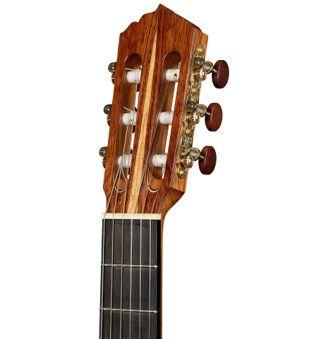 The headstock of a 2025 Andy Culpepper classical guitar made of cedar and Honduran rosewood