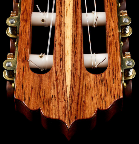 The headstock and tuning machines of a 2025 Andy Culpepper classical guitar made of cedar and Honduran rosewood